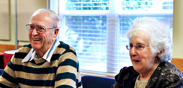 Seniors enjoying coffee hour at Homewoods